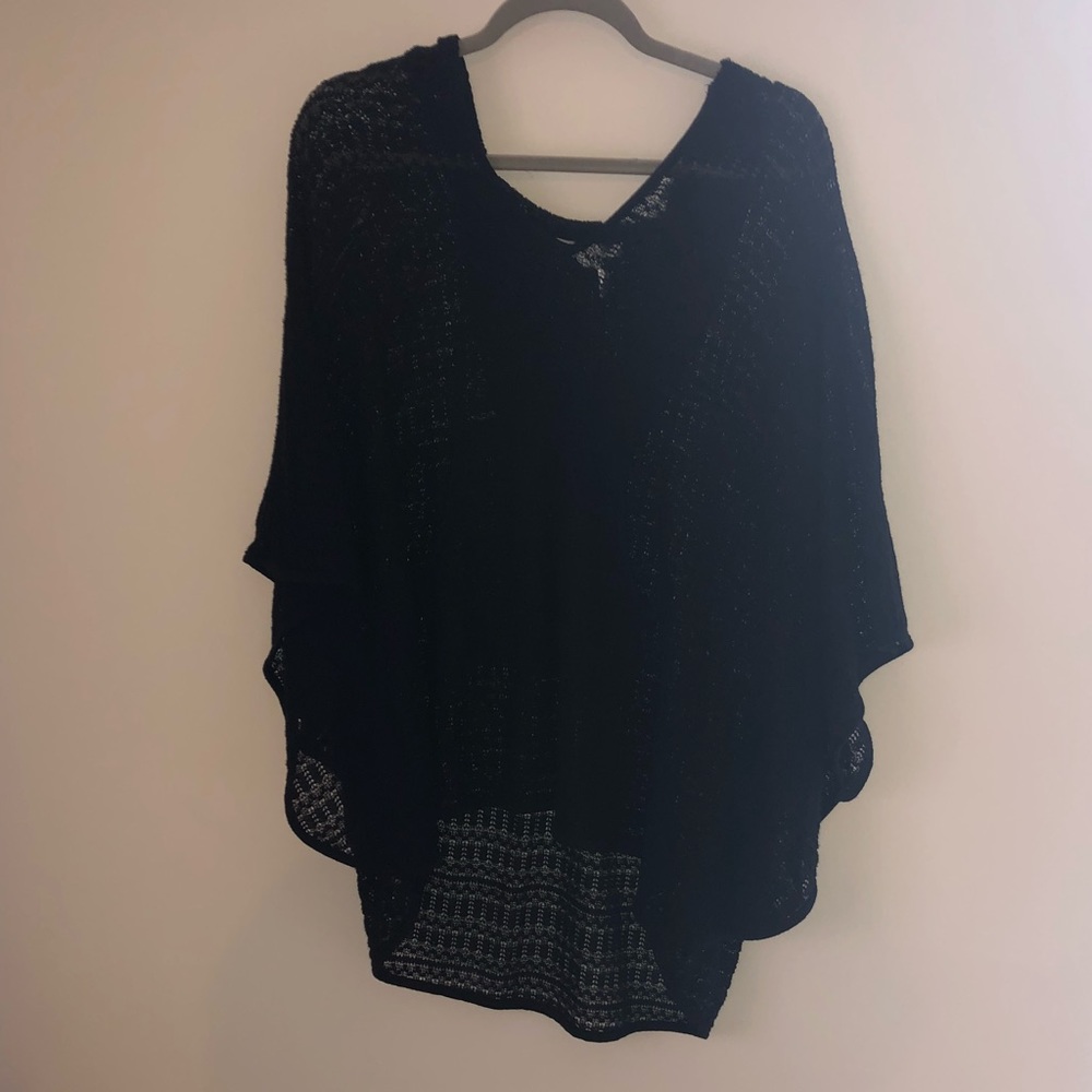 Black crochet material beach cover-up with hood